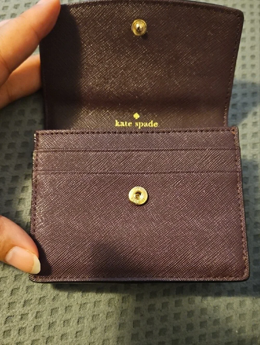 kate spade plum saffiano leather compact wallet with gold plaque
